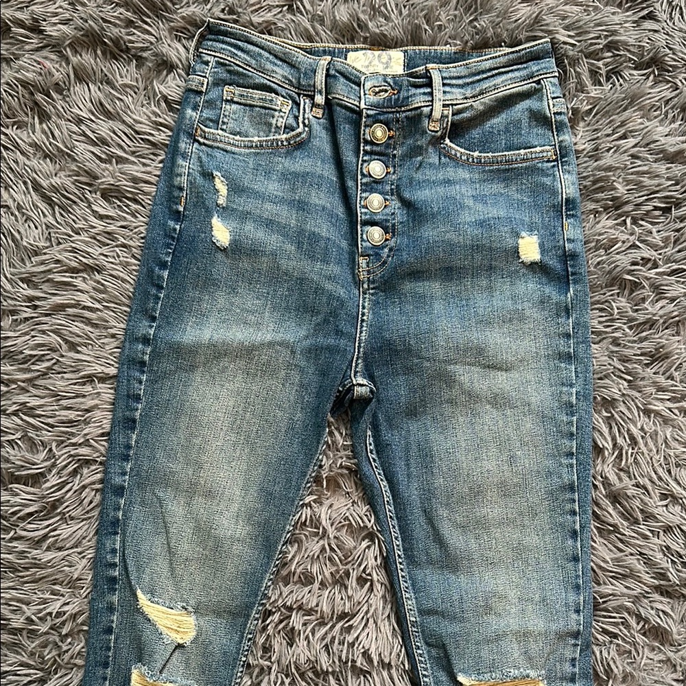 Blue Skinny Jeans with Distressed Details and Fading